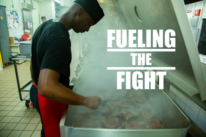 Lance Cpl. Anthony Anderson grills sirloin steaks in preparation for the afternoon rush of Marines and Sailors at the Camp Kinser Mess Hall, Okinawa, Japan, Aug. 15, 2018. Food service specialists provide food and cafeteria facilities for fleet Marine forces in both field and garrison environments. Anderson, a food service specialist with Food Service Company, Headquarters Regiment, 3rd Marine Logistics Group, is a native of Washington, D.C. (U.S. Marine Corps photo by Pfc. Mark Fike)