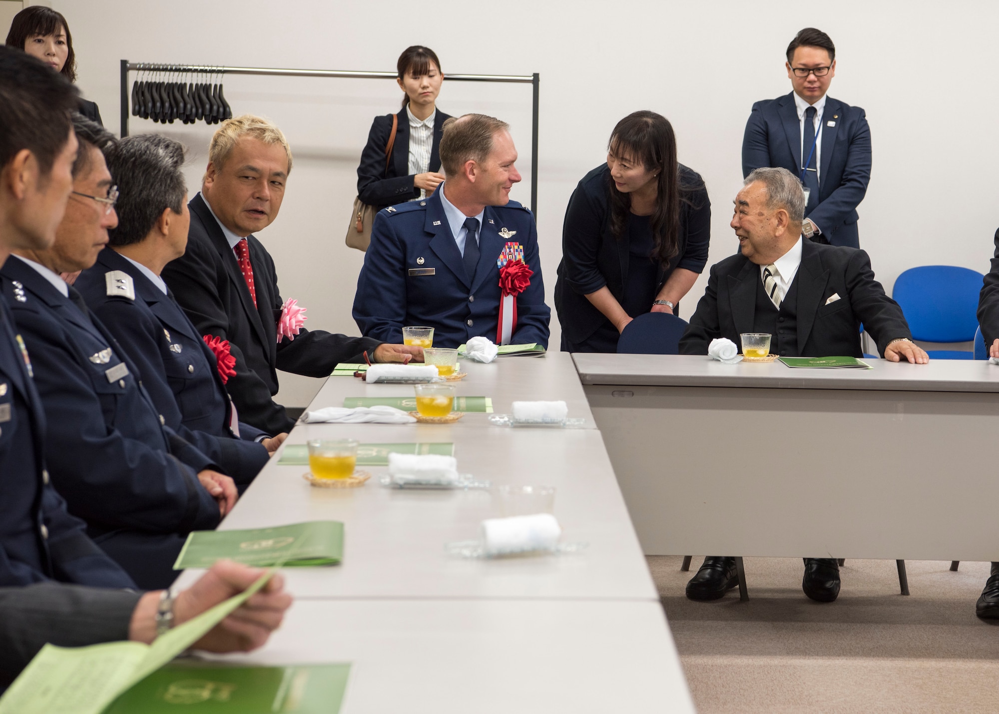 U.S. Air Force Col. Kristopher W. Struve, left, the 35th Fighter Wing commander, speaks with Kazumasa Taneichi, right, the Misawa City Mayor, during a meeting at the Misawa City 60th anniversary celebration ceremony held at the Misawa International Center in Misawa City, Japan, Sept. 1, 2018. Taneichi expressed gratitude to all parties that support and promote Misawa City’s growth. (U.S. Air Force photo by Airman 1st Class Collette Brooks)
