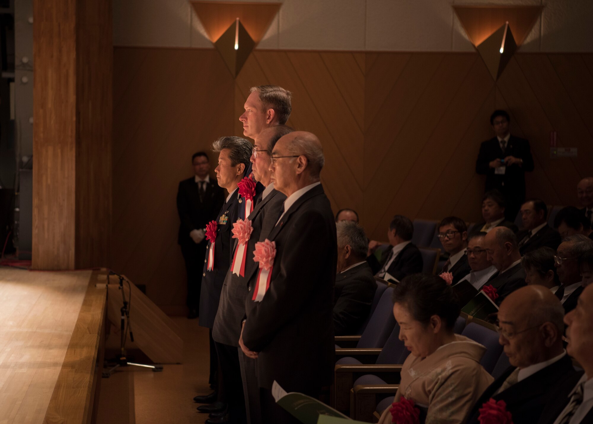 Misawa Air Base attendees receive recognition for supporting Misawa City growth stand during the Misawa City 60th anniversary celebration ceremony held at the Misawa International Center in Misawa City, Japan, Sept. 1, 2018. The ceremony highlighted Misawa Air Base commanders from the 35th Fighter Wing, 3rd Air Wing, Northern Air Defense Force and Naval Air Force- Misawa for their contributions to Misawa City’s growth and development. (U.S. Air Force photo by Airman 1st Class Collette Brooks)