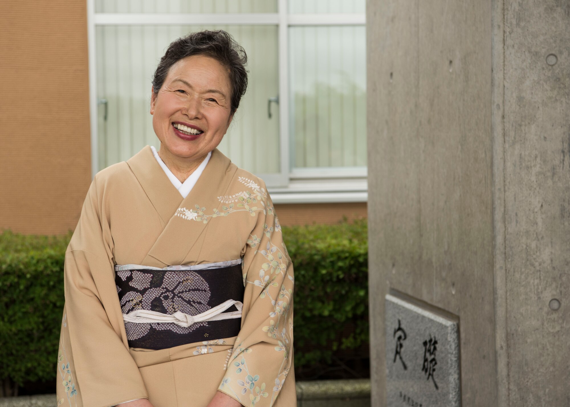 A Misawa City resident poses for a photo at the Misawa City 60th anniversary celebration ceremony held at the Misawa International Center in Misawa City, Japan, Sept. 1, 2018. Kazumasa Taneichi, the Misawa City mayor, noted he is impressed with Misawa City residents’ resiliency when faced with challenges such as natural disasters. (U.S. Air Force photo by Airman 1st Class Collette Brooks)