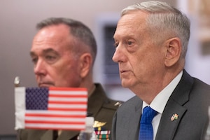 Defense Secretary James N. Mattis and Marine Corps Gen. Joe Dunford, chairman of the Joint Chiefs of Staff,attend a meeting.