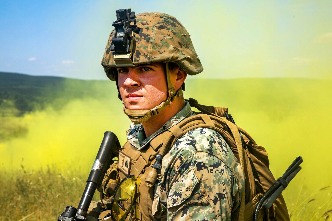 A Marine provides security during medical evacuation training.