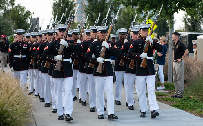 The Silent Drill Platoon exits Marine Week Charlotte’s opening ceremony in downtown Charlotte, N.C., Sept. 5, 2018. Marine Week is an annual event that allows members of the Marine Corps to demonstrate their capabilities and allows the public to interact with service members. Marine Week Charlotte is an opportunity for Marines to reconnect with our Marines, sailors, veterans, and their families from different generations.