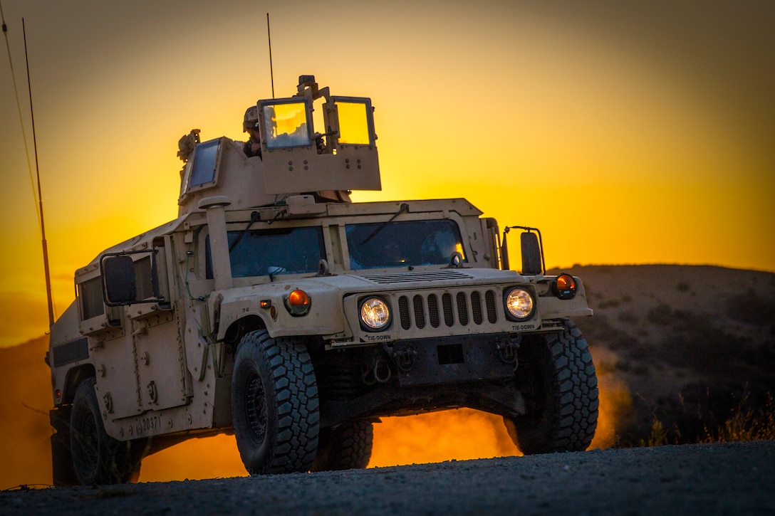 U.S. Marines with Combat Service Support Company, I Marine Expeditionary Force Support Battalion, I Marine Expeditionary Force, patrol in a humvee during a field exercise at Marine Corps Base Camp Pendleton, Calif., Aug. 14, 2018. The FEX exposed battalion Marines to field conditions, and will prepare them to meet operational and training objectives in the upcoming year.