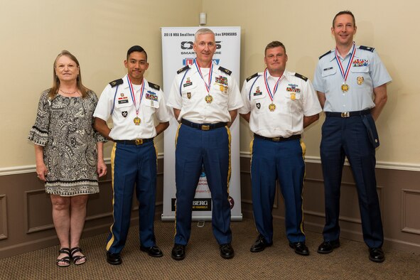 Lt. Col. Robert Davis, far right, 93d Air Ground Operations Wing director of complaints resolution, poses for a photo with other participants during the 2018 National Rifle Association (NRA) National Smallbore Rifle Championships, July 30, 2018, in Bristol, Ind. Davis, who is the captain of the Air Force International Rifle Team, won his first national championship victory in the metric prone category. Davis hopes to develop a shooting clinic to improve base defenders’ marksmanship skills. (Courtesy photo)