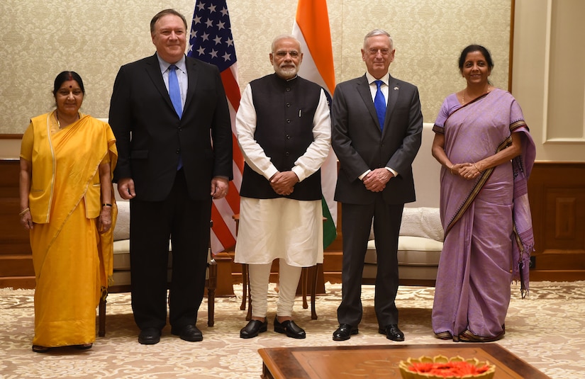 U.S. and Indian leaders pose for a photo.