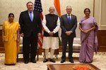 U.S. and Indian leaders pose for a photo.