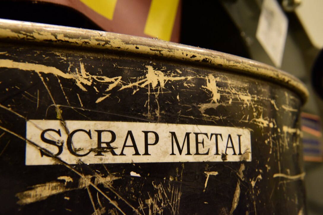 One of the many scrap metal bins spread throughout the 28th Maintenance Squadron metals technology shop lays open for unserviceable metal pieces. The metals technology shop runs 24-hour operations to provide different metals technologies for all squadrons on base. (U.S. Air Force photo by Airman John Ennis)