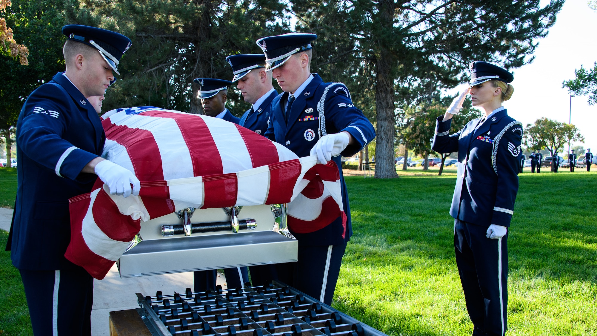 Honor guard members perform a full-honors funeral during their graduation ceremony at Hill Air Force Base, Utah, on Aug. 29, 2018. The active-duty funeral service requires a minimum 20-member team and encompasses all honor guard funeral service duties. (U.S. Air Force photo by R. Nial Bradshaw)