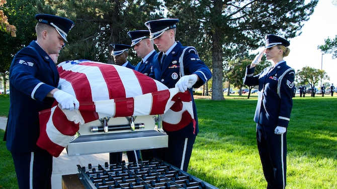 Honor guard members perform a full-honors funeral during their graduation ceremony at Hill Air Force Base, Utah, on Aug. 29, 2018. The active-duty funeral service requires a minimum 20-member team and encompasses all honor guard funeral service duties. (U.S. Air Force photo by R. Nial Bradshaw)