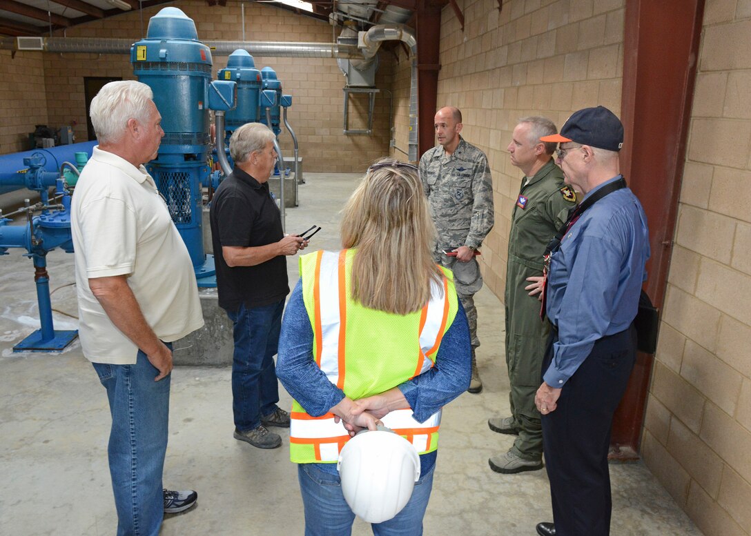 Thomas Allen, 412th Civil Engineer Squadron, shows how the Edwards Wastewater Treatment Plant is laid out to a tour group Sept. 4. The treatment plant was built in 1996. (U.S. Air Force photo by Kenji Thuloweit)