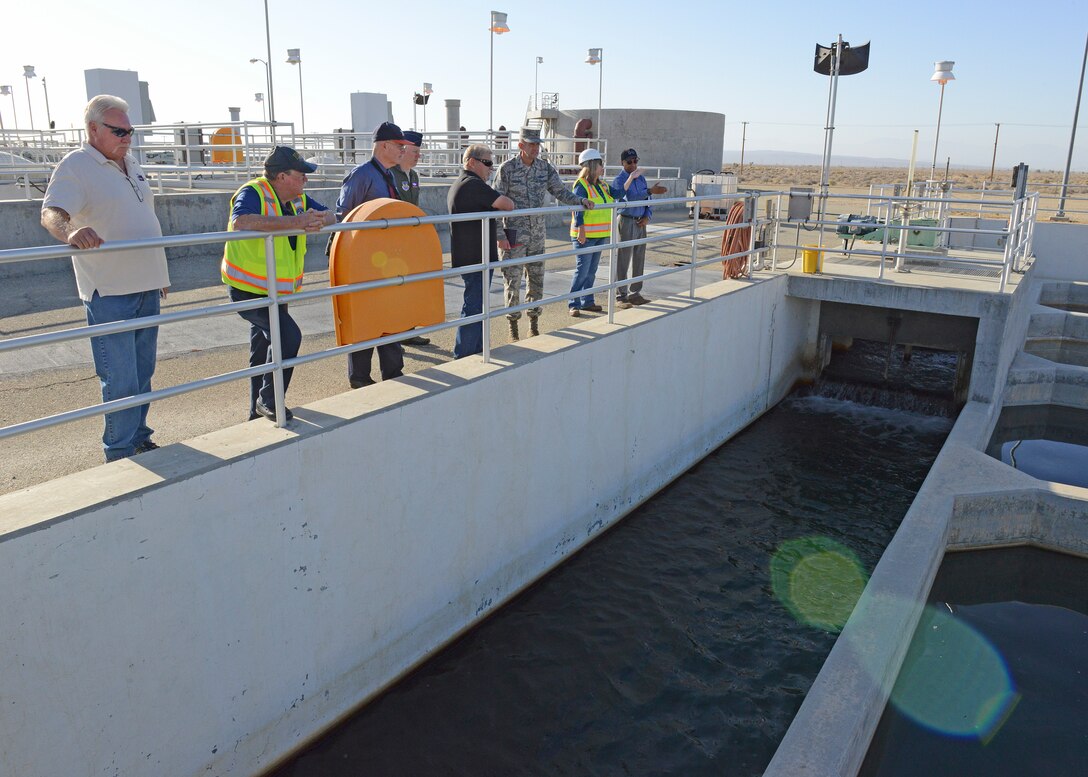 Brig. Gen. E. John Teichert, 412th Test Wing commander, and Col. Kirk Reagan, 412th TW vice commander, tour the Edwards Wastewater Treatment Plant located at the southern part of the base Sept. 4. (U.S. Air Force photo by Kenji Thuloweit)