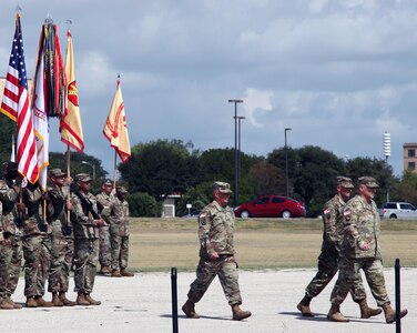 Lt. Gen. Kenneth R. Dahl, outgoing commanding general, U.S. Army Installation Management Command (walking, center), is accompanied by Lt. Gen. Bradley A. Becker and Gen. Mark A. Milley at the IMCOM change of command ceremony ceremonies at Joint Base San Antonio-Fort Sam Houston Sept. 5.