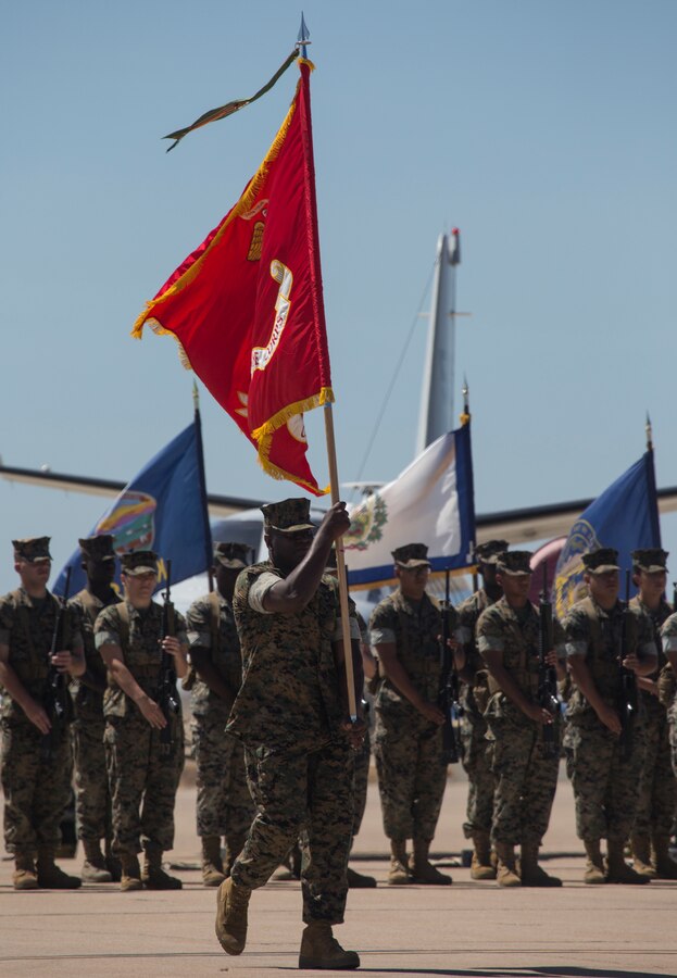 U.S. Marine Sgt. Maj. Alfred R. Broadus, sergeant major of Headquarters and Headquarters Squadron, transfers the unit colors during the change of command and retirement ceremony at Marine Corps Air Station Miramar, Calif., Aug. 30.  The ceremony officially recognized Spears for his 23 years of honorable service to the Marine Corps and his time as the commanding officer of H&HS from July 2016 through August 2018. (U.S. Marine Corps photo by Cpl. Becky Cleveland)
