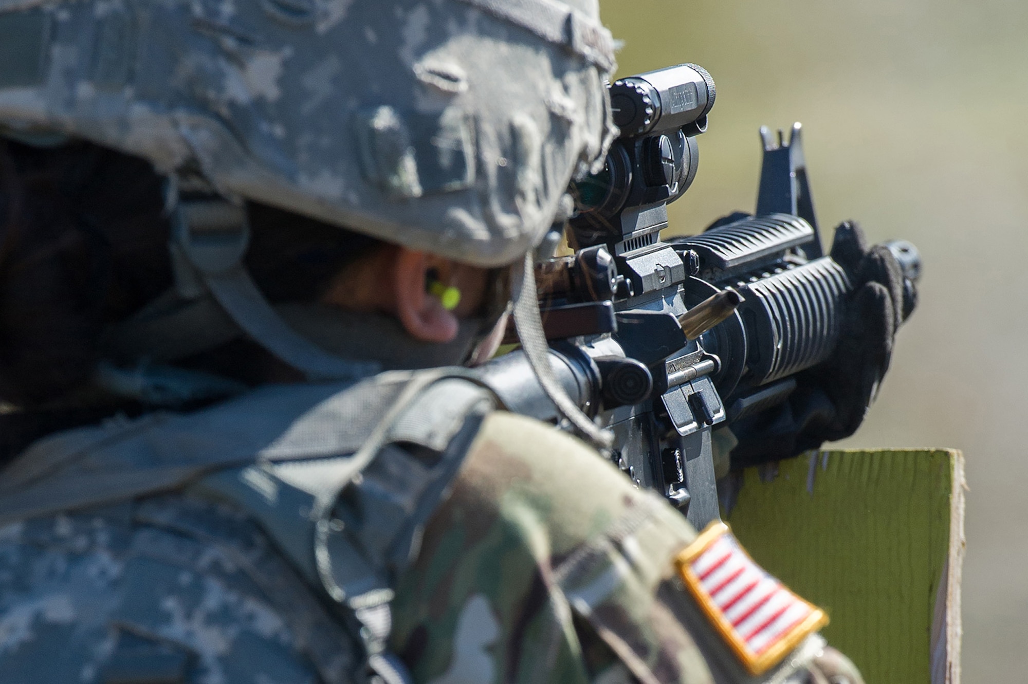 Army Staff Sgt. Daniell Garcia, assigned to the Joint Base Lewis-McChord based 13th Combat Support Sustainment Battalion, a native of Rocky Ford, Colo., competes in the first day of the America’s First Corps 2-Gun Sharpshooter Competition sponsored by U.S. Army Alaska's Sharpshooter Team at the Joint Base Elmendorf-Richardson, Alaska, Range Complex, Sept. 5, 2018.  Ten five-soldier teams assigned to multiple units throughout I Corps will compete in six stages of competition over two days with U.S. Army issued weapons for top sharpshooter honors.