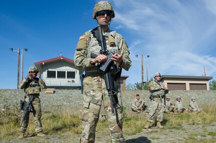 Army Spc. Nicholas Riccio, a native of Charleston, Ill., assigned to the Joint Base Lewis-McChord based 13th Combat Support Sustainment Battalion, loads ammunition into a magazine while waiting to compete in the first day of the America’s First Corps 2-Gun Sharpshooter Competition sponsored by U.S. Army Alaska's Sharpshooter Team at the Joint Base Elmendorf-Richardson, Alaska, Range Complex, Sept. 5, 2018.  Ten five-soldier teams assigned to multiple units throughout I Corps will compete in six stages of competition over two days with U.S. Army issued weapons for top sharpshooter honors.