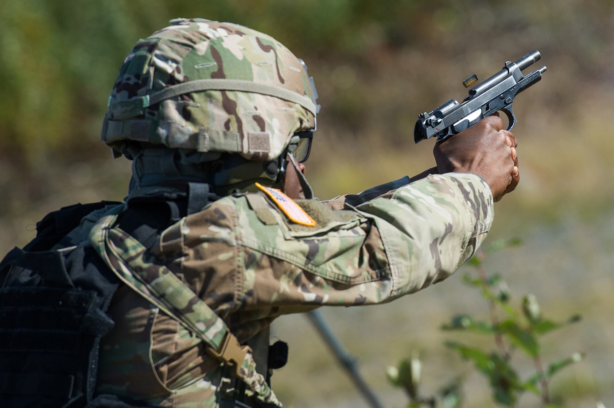 Army Spc. Antonio Brown, a native of Little Rock, Ark., assigned to the Joint Base Lewis-McChord based 13th Combat Support Sustainment Battalion, competes in the first day of the America’s First Corps 2-Gun Sharpshooter Competition sponsored by U.S. Army Alaska's Sharpshooter Team at the Joint Base Elmendorf-Richardson, Alaska, Range Complex, Sept. 5, 2018.  Ten five-soldier teams assigned to multiple units throughout I Corps will compete in six stages of competition over two days with U.S. Army issued weapons for top sharpshooter honors.