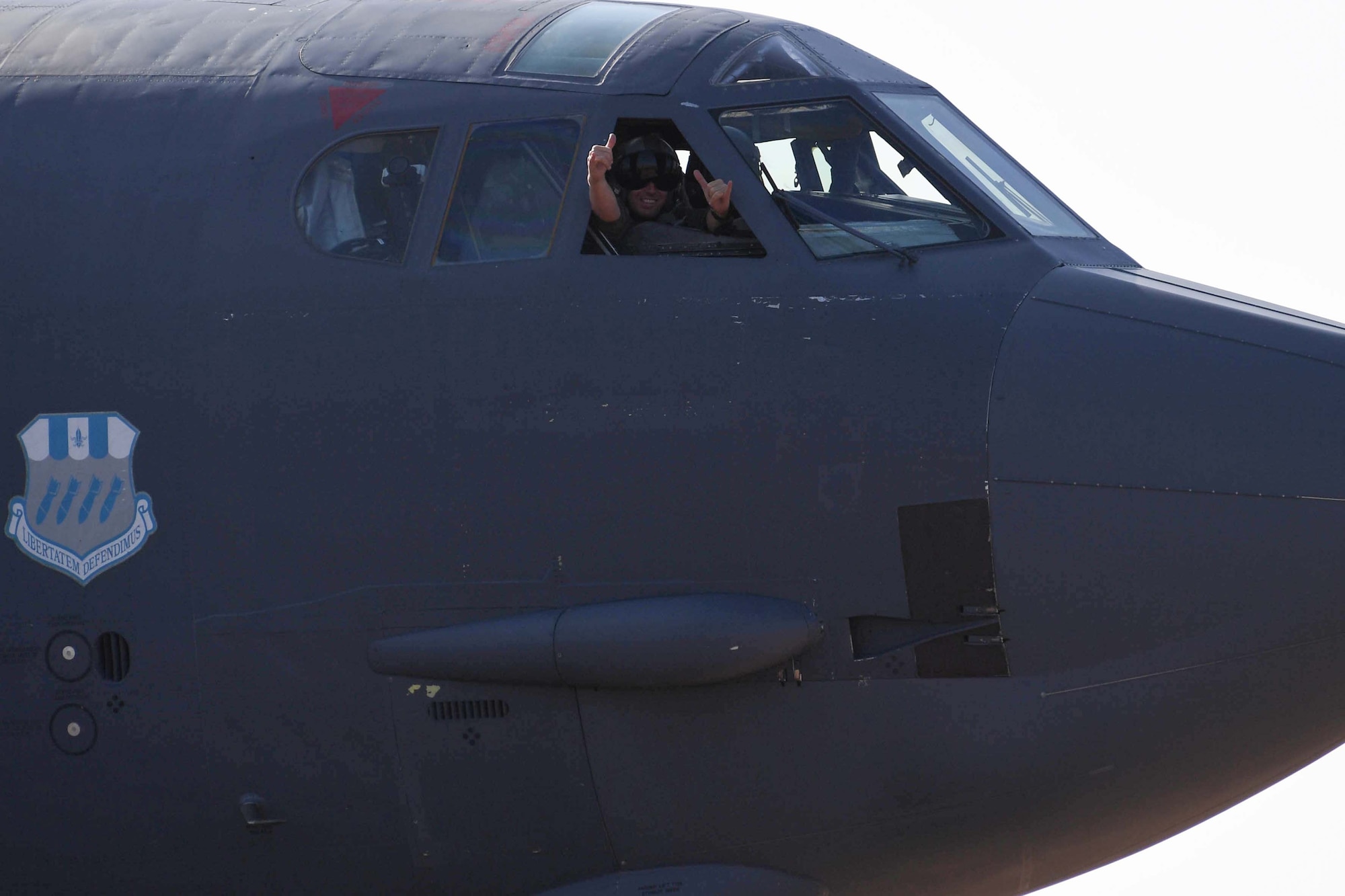 A B-52 Stratfortress pilot gives the thumbs up sign after arriving at RAF Fairford, United Kingdom, Sept. 5, 2018.   The jet arrived from Barksdale Air Force Base, Louisiana and is in the U.K. as part of the Air Force’s bomber task force operations.  Such operations are routinely conducted to demonstrate the United States’ commitment to allies and partners in the region and enhance readiness to respond to any contingencies around the globe.  They also provide opportunities to work with allies and partners in the region. (U.S. Air Force photo by Master Sgt. Ted Daigle/not released)