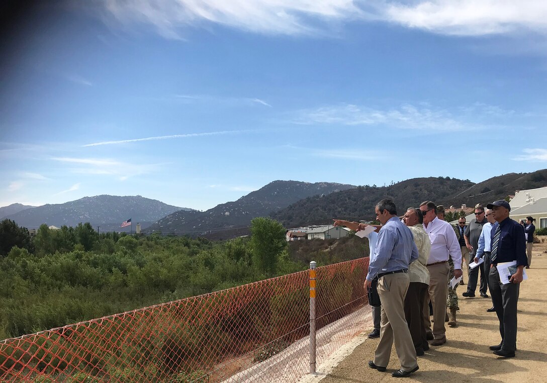 Representatives with the U.S. Army Corps of Engineers Los Angeles District, the City of Temecula, Riverside County Flood Control District and Rep. Ken Calvert, 42nd Congressional District, look at Phase 1 of the Murrieta Creek Flood Protection and Environmental Restoration project during an Aug. 28 site visit in Temecula, California.