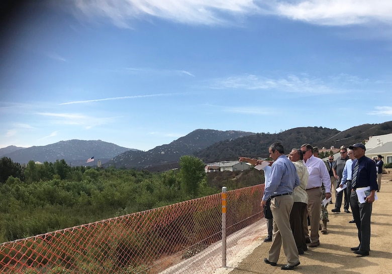 Representatives with the U.S. Army Corps of Engineers Los Angeles District, the City of Temecula, Riverside County Flood Control District and Rep. Ken Calvert, 42nd Congressional District, look at Phase 1 of the Murrieta Creek Flood Protection and Environmental Restoration project during an Aug. 28 site visit in Temecula, California.