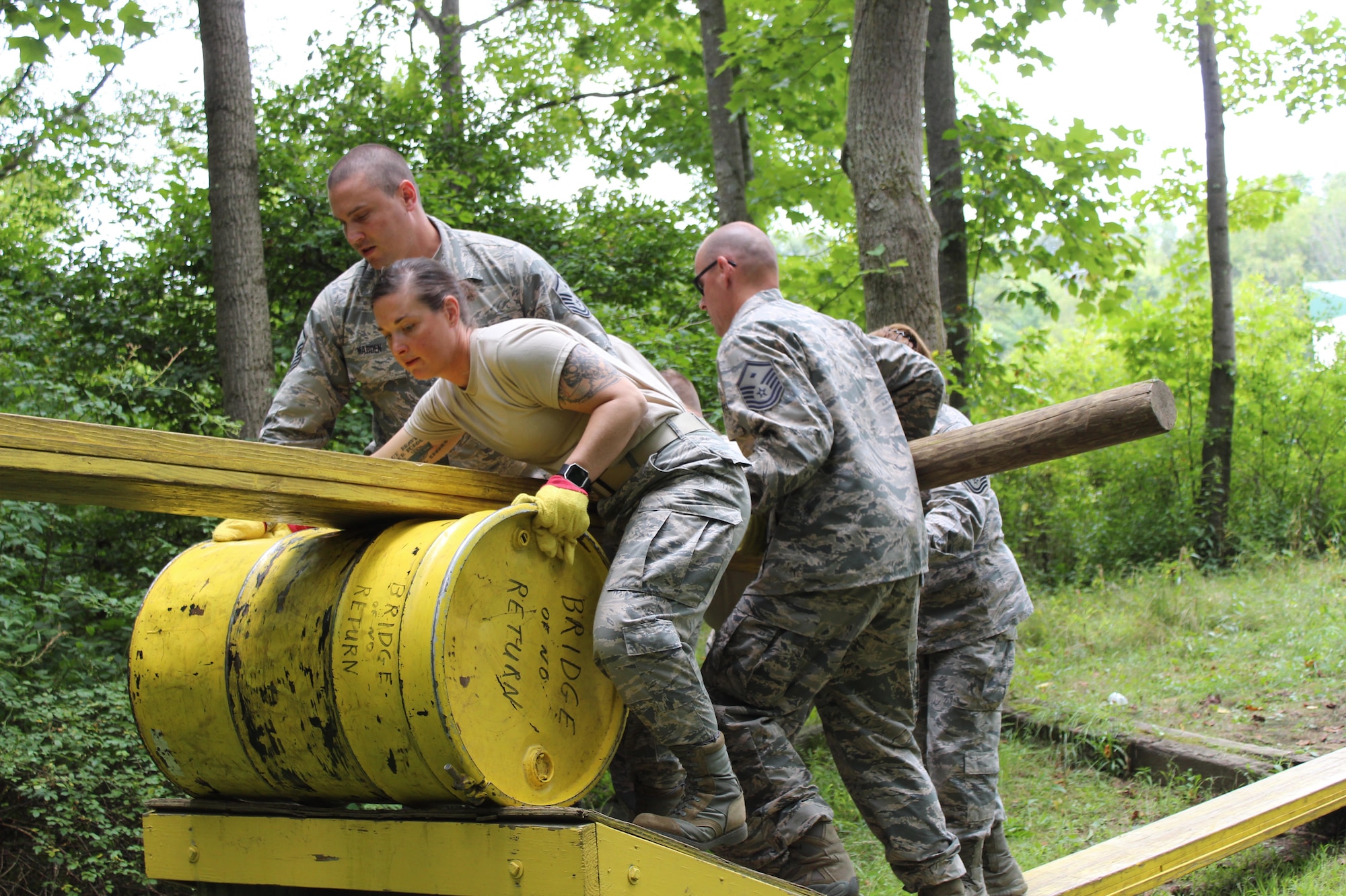 First sergeants from Youngstown Air Reserve Station, Niagara Falls Air Reserve Station and Pittsburgh Air Reserve Station went to Camp Ravenna split into two teams and utilized Ravenna’s leadership reaction course, an obstacle course that limits the teams resources and gives vague instructions forcing the participants to work together to overcome each obstacle. The 910th Airlift Wing hosted a First Sergeant Retreat and Team Building Activity for the first time August 24 through 26 at YARS and CR. The 911th Airlift Wing in Pittsburgh has already decided to host next year’s event.