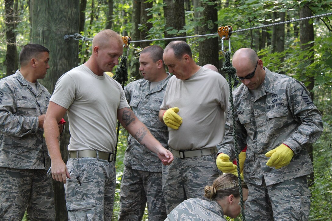 First sergeants from Youngstown Air Reserve Station, Niagara Falls Air Reserve Station and Pittsburgh Air Reserve Station went to Camp Ravenna split into two teams and utilized Ravenna’s leadership reaction course, an obstacle course that limits the teams resources and gives vague instructions forcing the participants to work together to overcome each obstacle. The 910th Airlift Wing hosted a First Sergeant Retreat and Team Building Activity for the first time August 24 through 26 at YARS and CR. The 911th Airlift Wing in Pittsburgh has already decided to host next year’s event.