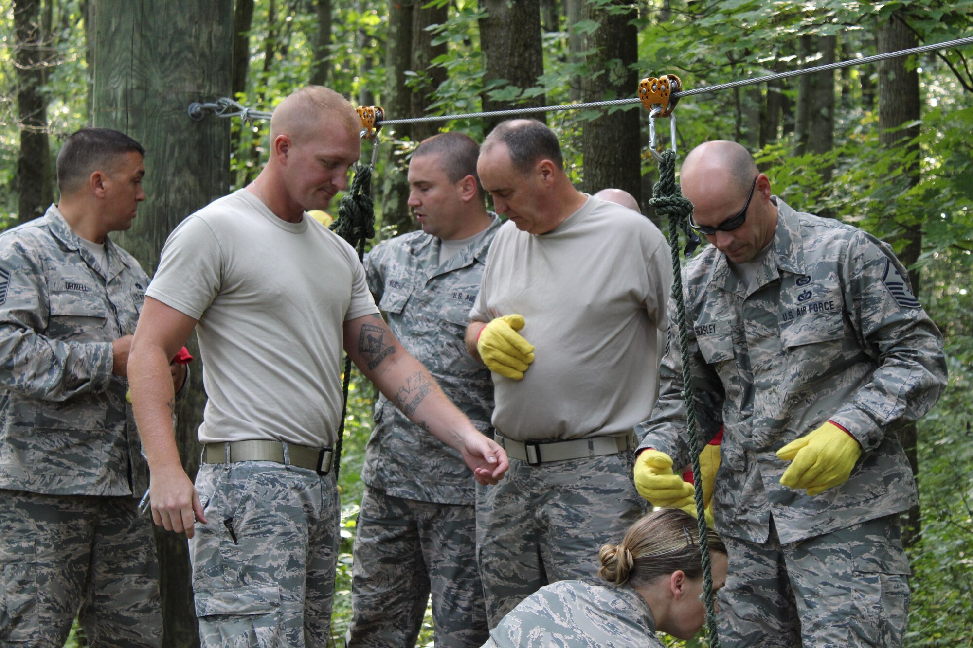 First sergeants from Youngstown Air Reserve Station, Niagara Falls Air Reserve Station and Pittsburgh Air Reserve Station went to Camp Ravenna split into two teams and utilized Ravenna’s leadership reaction course, an obstacle course that limits the teams resources and gives vague instructions forcing the participants to work together to overcome each obstacle. The 910th Airlift Wing hosted a First Sergeant Retreat and Team Building Activity for the first time August 24 through 26 at YARS and CR. The 911th Airlift Wing in Pittsburgh has already decided to host next year’s event.