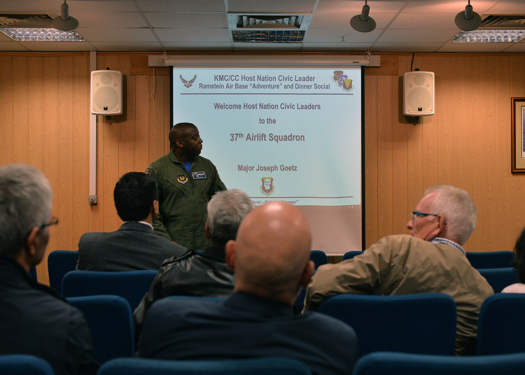 U.S. Air Force Lt. Col. Jonathan Cato, 37th Airlift Squadron commander, briefs local civilian leaders before an orientation flight on Ramstein Air Base, Germany, Aug. 31, 2018. After the briefing, host nation civic leaders were flown over Germany in a C-130J Super Hercules to help build an understanding of the base’s daily mission set.