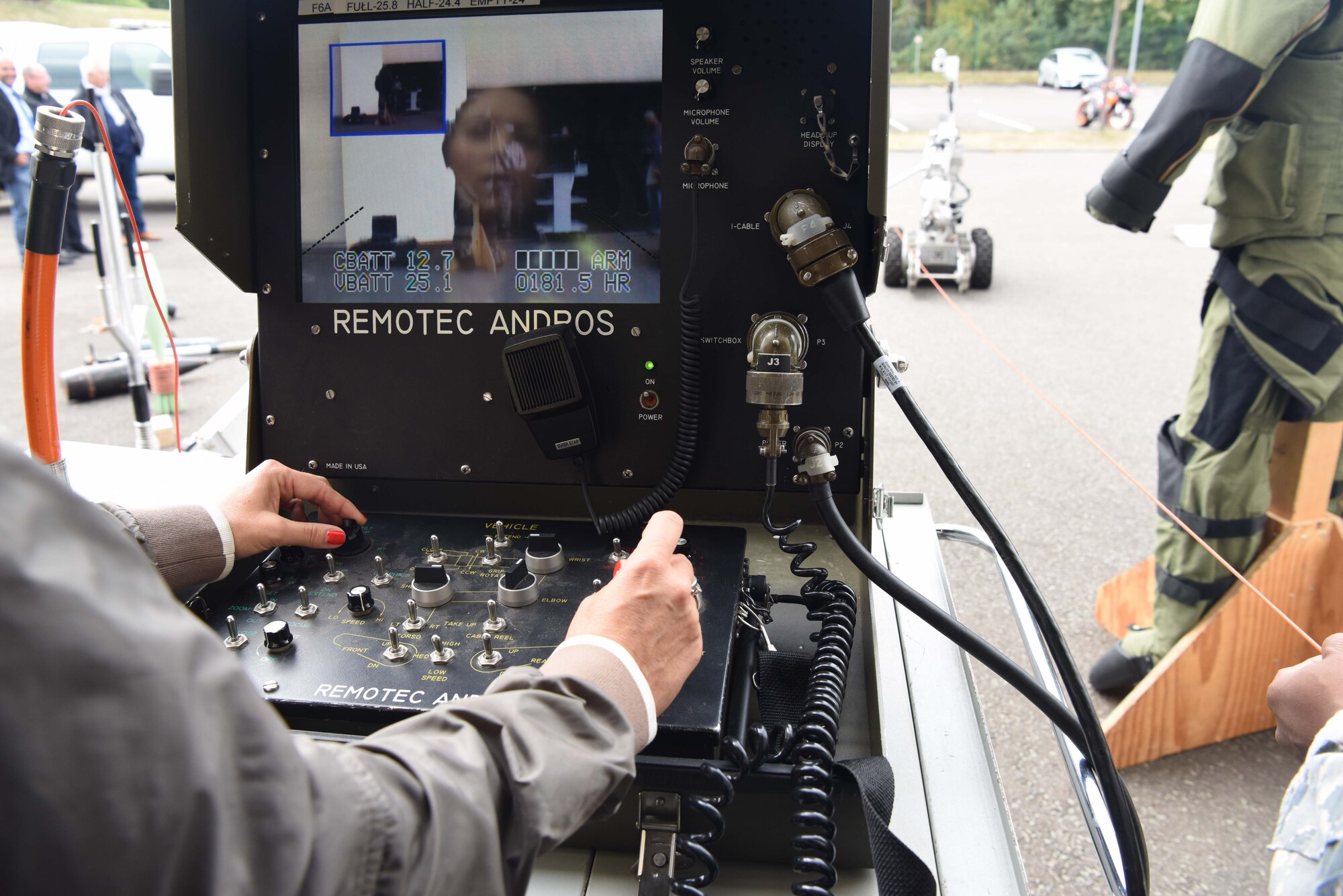 Anja Pfeiffer, Weilerabach mayor, handles the controls of an explosive ordinance robot on Ramstein Air Base, Germany, Aug. 31, 2018. The Explosive Ordinance Disposal   team showed civic leaders the types of bombs they diffuse and the equipment that assist them.