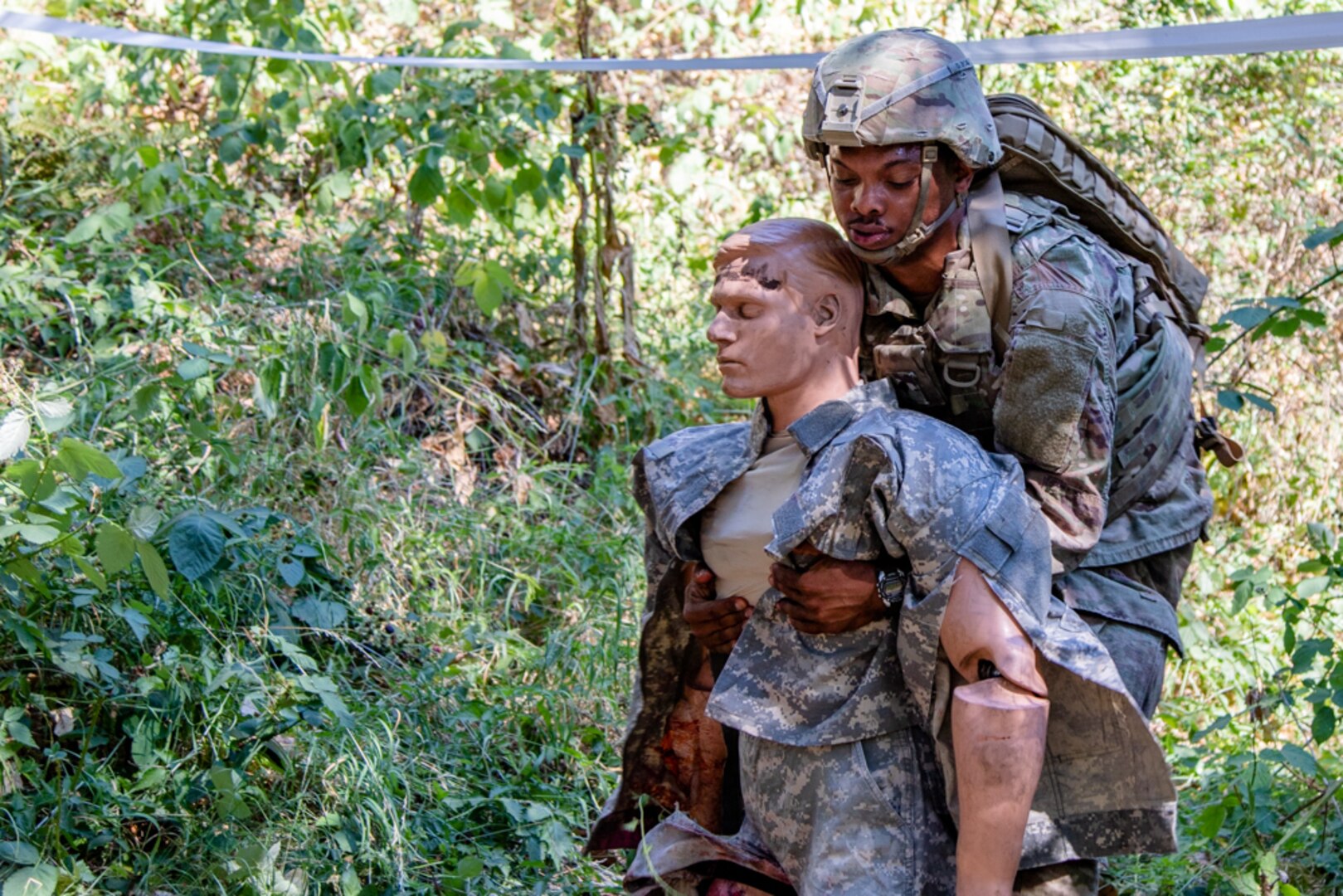 Spc. Jakari Ford, with 1-229 Attack Reconnaissance Battalion, 16th Combat Aviation Brigade, competes for the Regional Health Command-Pacific Best Medic competition at Joint Base Lewis-McChord, Wash., Aug. 7. The competition brought the best medics across the Pacific Region - Washington, Hawaii, Alaska, Japan and Korea.