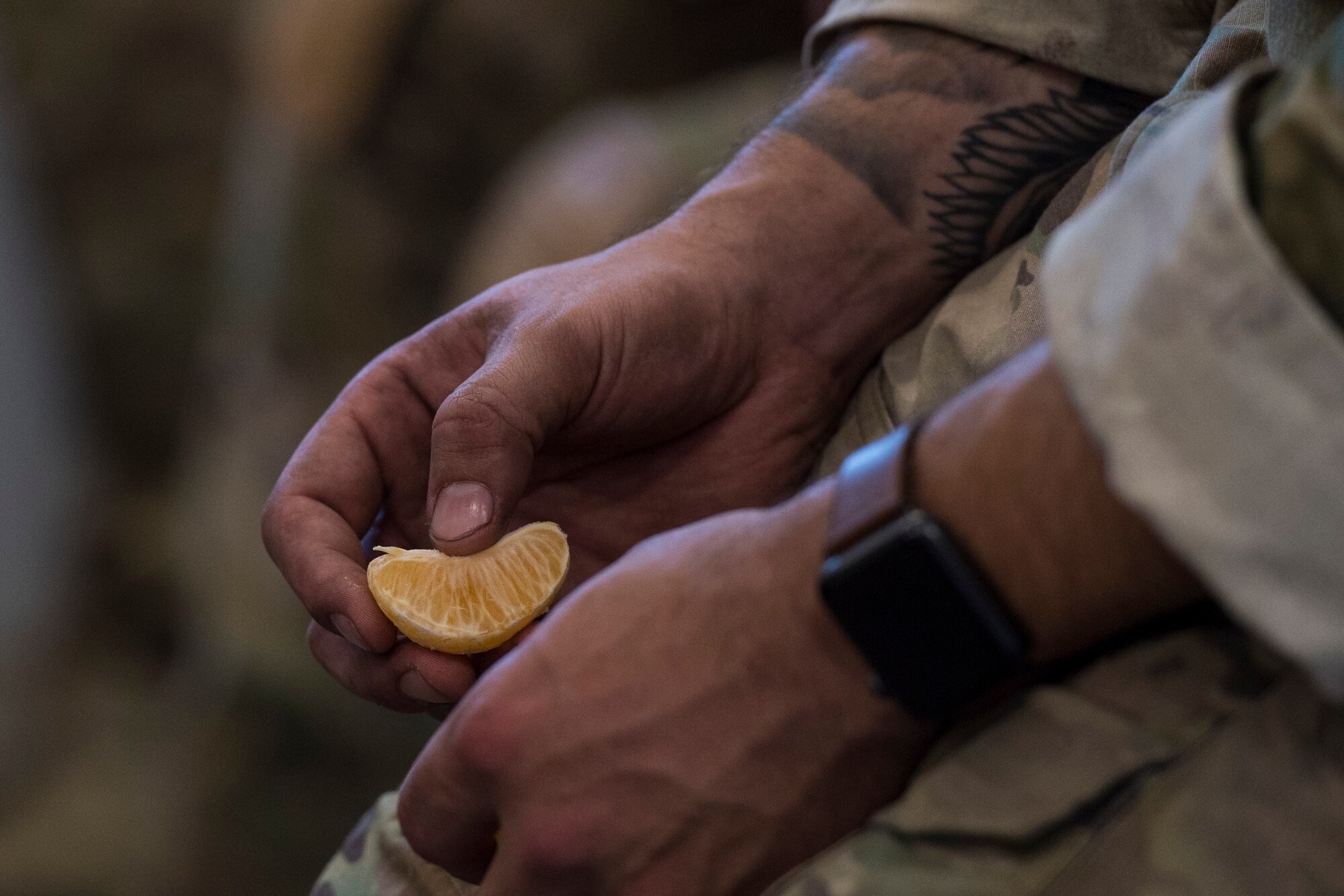 A student eats a snack during a full spectrum operator course, Aug. 27, 2018, at Smoky Hill Air National Guard Range, Kan. The course was held Aug. 26-31, and incorporated specific duties performed by tactical air control party members and security forces personnel to build on their gunfighting skills. (U.S. Air Force photo by Senior Airman Janiqua P. Robinson)