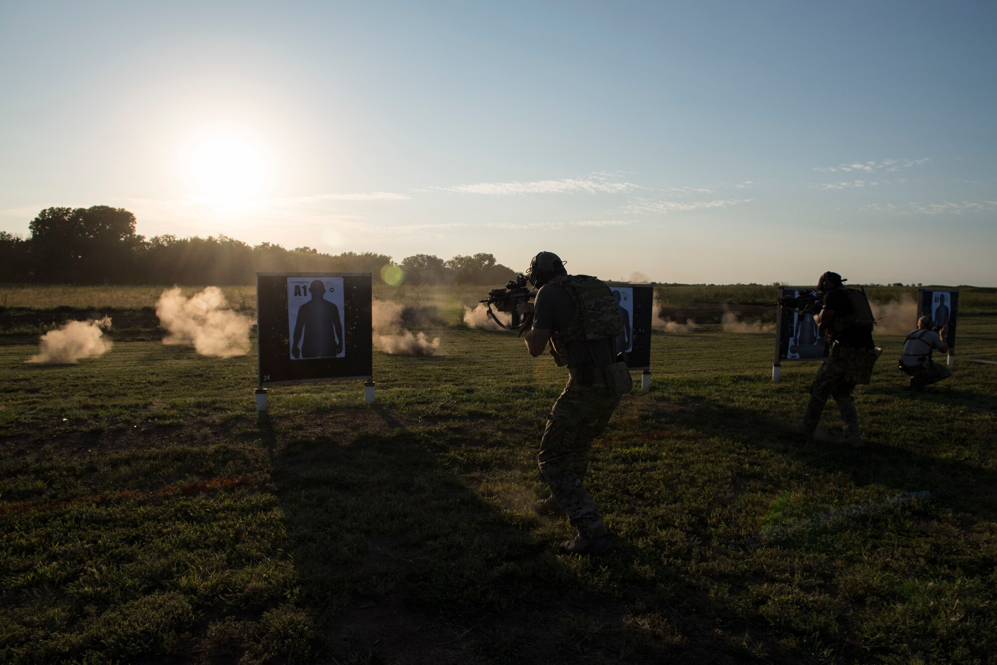 Students fire M4 carbines at targets during a full spectrum operator course, Aug. 29, 2018, at Smoky Hill Air National Guard Range, Kan. The course was held Aug. 26-31, and incorporated specific duties performed by tactical air control party members and security forces personnel to build on their gunfighting skills. (U.S. Air Force photo by Senior Airman Janiqua P. Robinson)