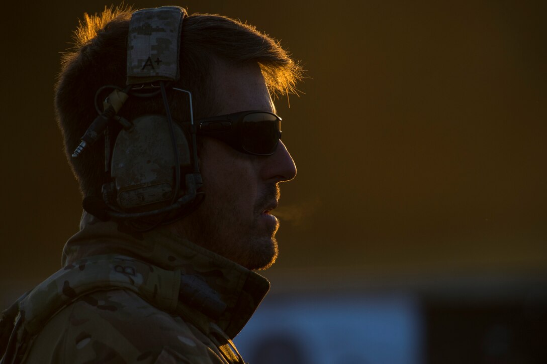 Brian Hartman, chief instructor, gives a firing command during a full spectrum operator course, Aug. 29, 2018, at Smoky Hill Air National Guard Range, Kan. The course was held Aug. 26-31, and incorporated specific duties performed by tactical air control party members and security forces personnel to build on their gunfighting skills. (U.S. Air Force photo by Senior Airman Janiqua P. Robinson)