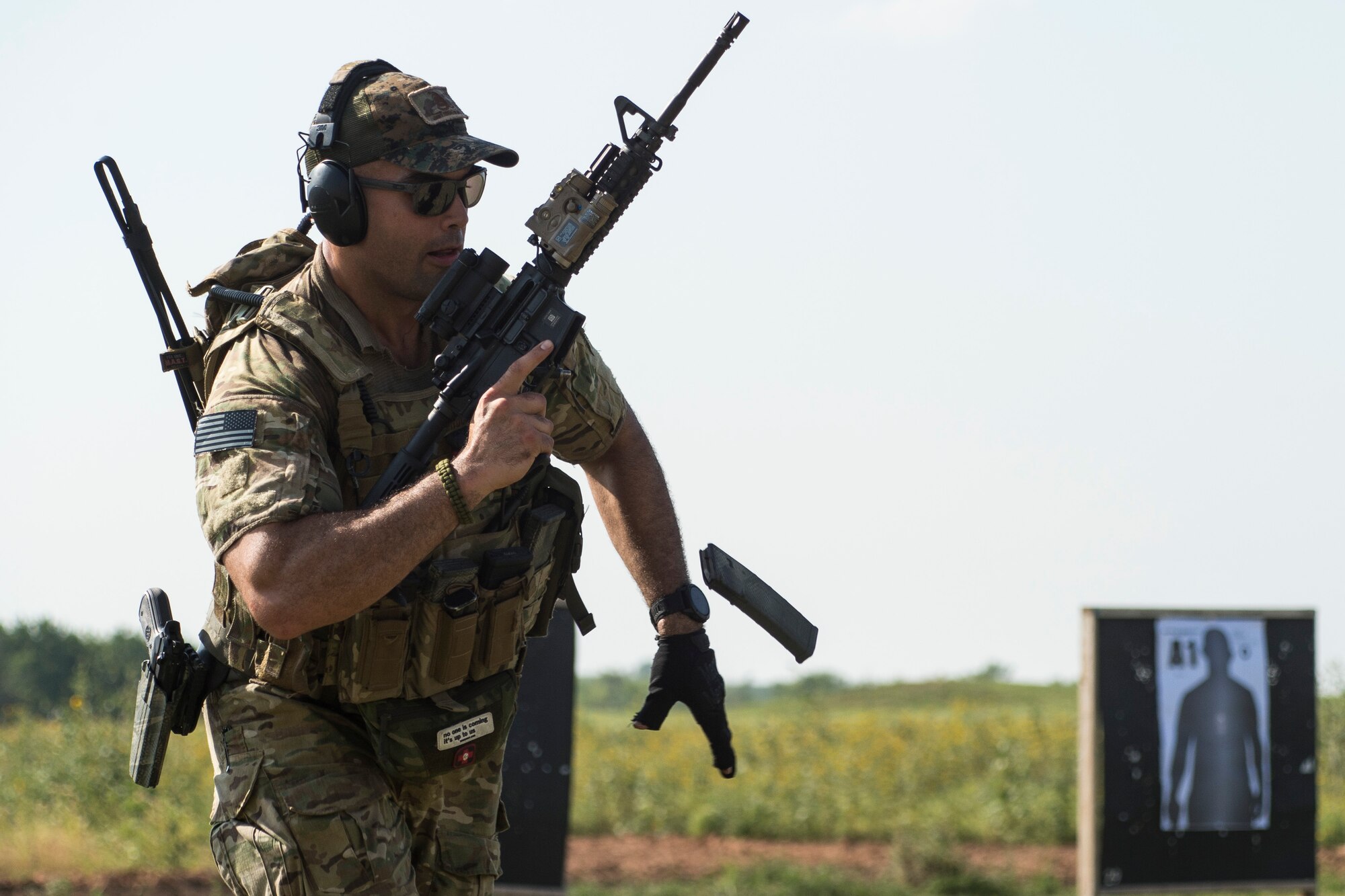 A student reloads an M4 carbine during a full spectrum operator course, Aug. 28, 2018, at Smoky Hill Air National Guard Range, Kan. The course was held Aug. 26-31, and incorporated specific duties performed by tactical air control party members and security forces personnel to build on their gunfighting skills. (U.S. Air Force photo by Senior Airman Janiqua P. Robinson)