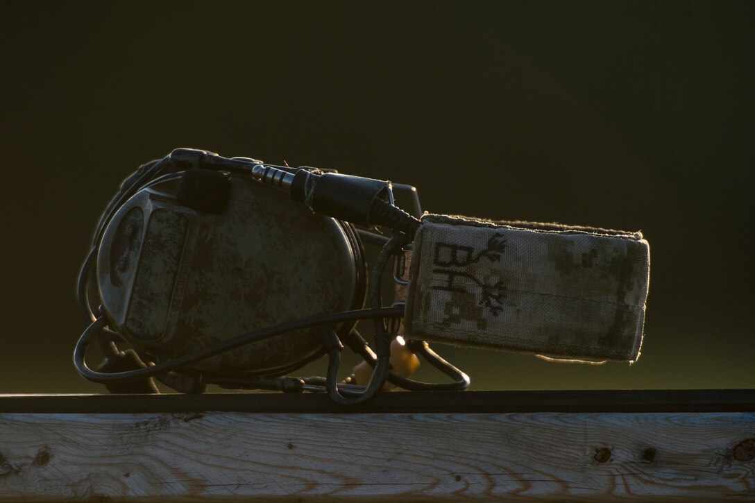 Ear protection rests on a target during a full spectrum operator course, Aug. 29, 2018, at Smoky Hill Air National Guard Range, Kan. The course was held Aug. 26-31, and incorporated specific duties performed by tactical air control party members and security forces personnel to build on their gunfighting skills. (U.S. Air Force photo by Senior Airman Janiqua P. Robinson)