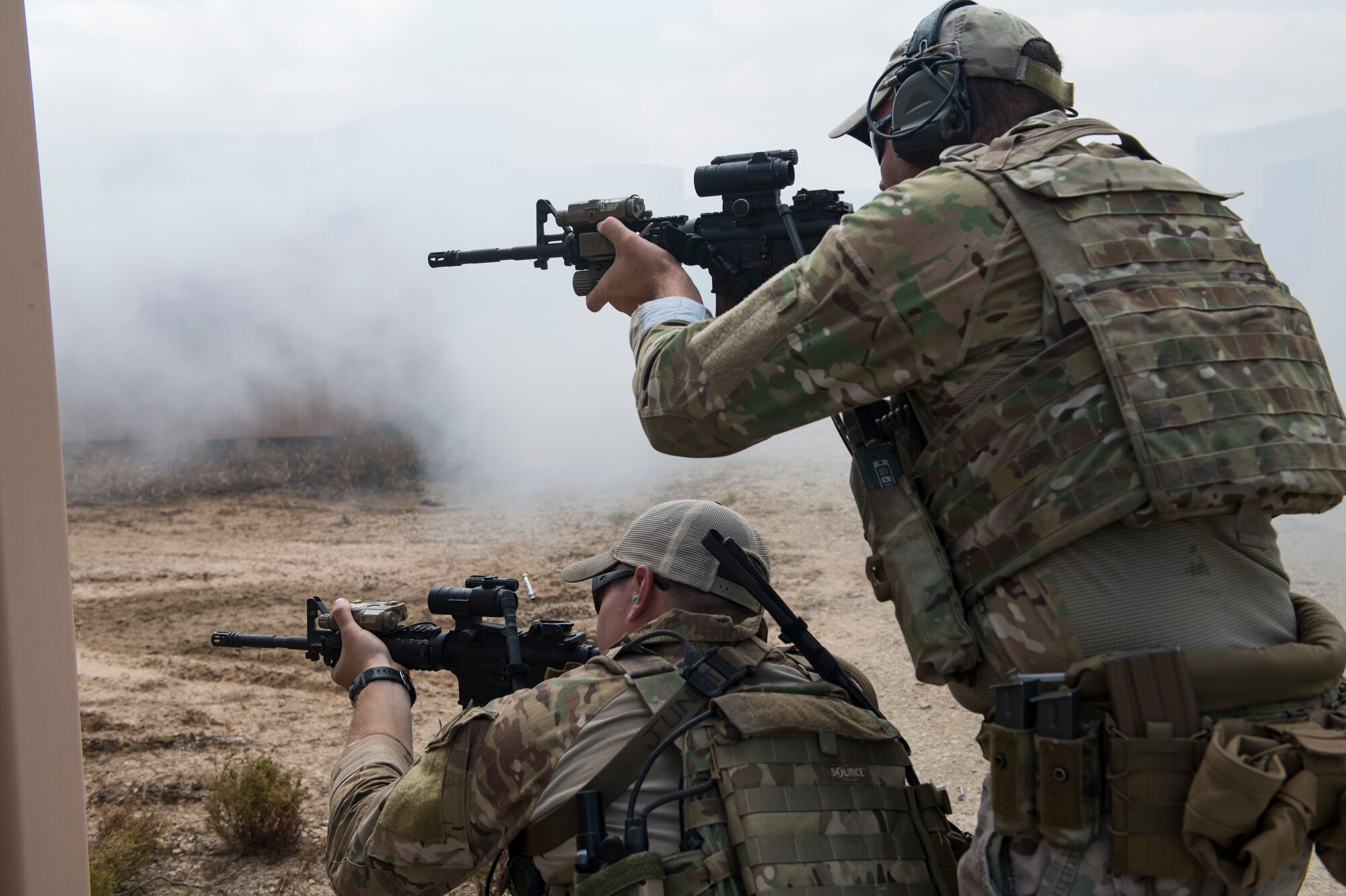 Students aim down the sights of M4 carbines during a full spectrum operator course, Aug. 30, 2018, at Smoky Hill Air National Guard Range, Kan. The course was held Aug. 26-31, and incorporated specific duties performed by tactical air control party members and security forces personnel to build on their gunfighting skills. (U.S. Air Force photo by Senior Airman Janiqua P. Robinson)