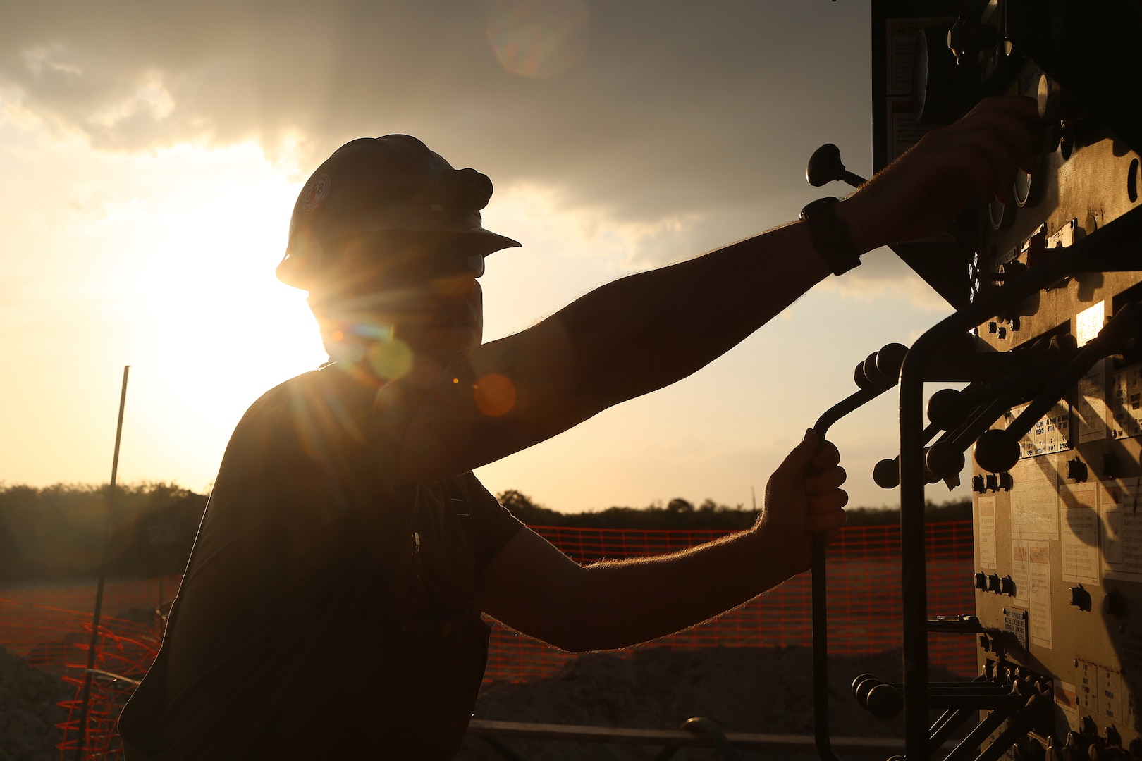 A U.S. Navy Equipment Operator drills during water well drilling exploration operations in Riohacha, Colombia.