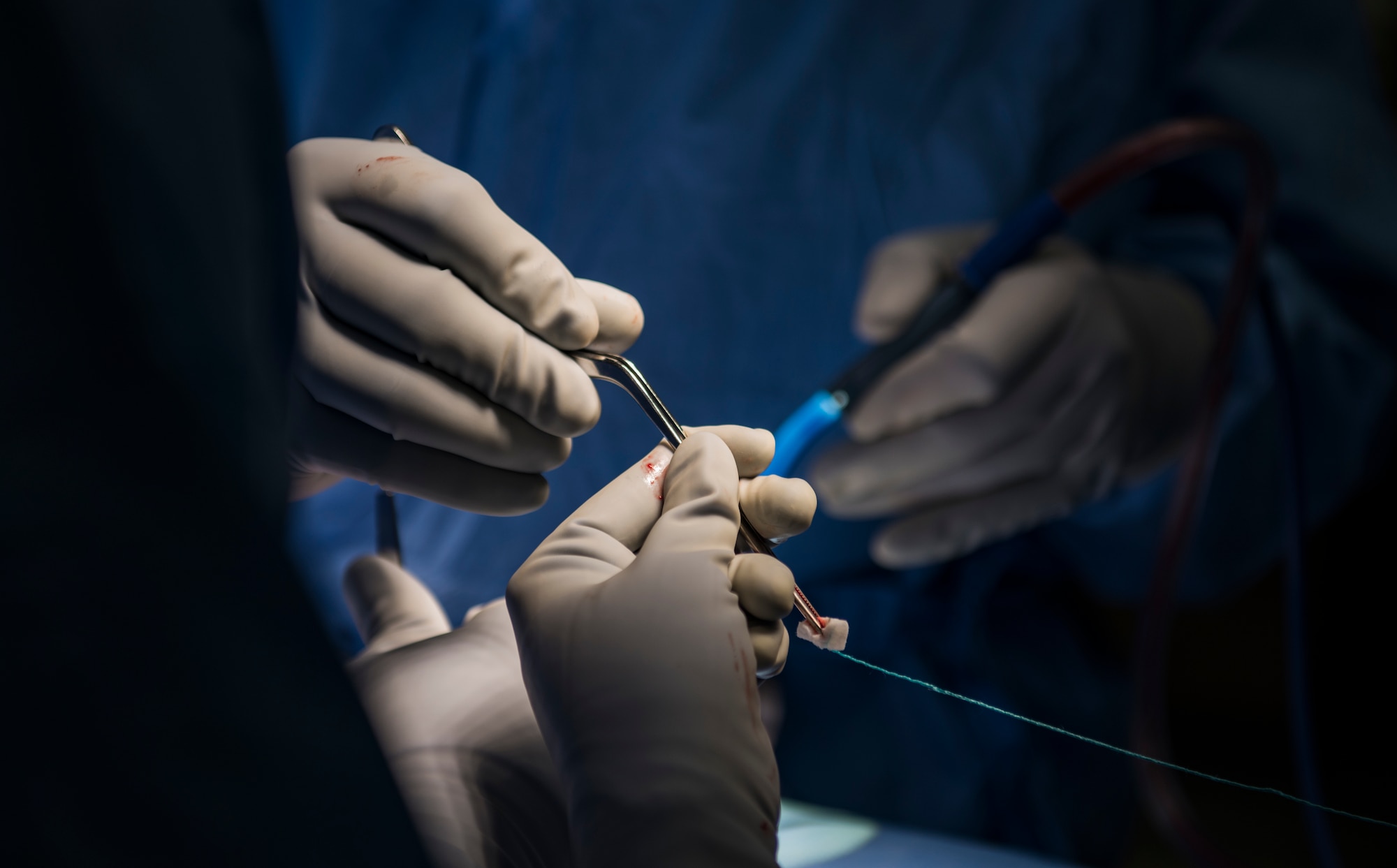 Airmen assigned to the 99th Medical Group perform in an orthopedic spine surgery at Nellis Air Force Base, Nevada, Aug. 27, 2018. Having in-house surgeons allows patients to bypass referrals downtown. (U.S. Air Force photo by Airman 1st Class Andrew D. Sarver)