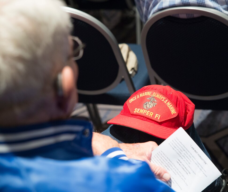 U.S. Marine Corps veterans from the Battle of Chosin Reservoir, and their family members gather at the Sheraton Norfolk Waterside Hotel, Norfolk, Va., for a memorial service to pay tribute to those who passed during the Korean War. The Marines who survived, along with soldiers and sailors are known as the Chosin Few. (Official U.S. Marine Corps photos by Chris Jones/Released)