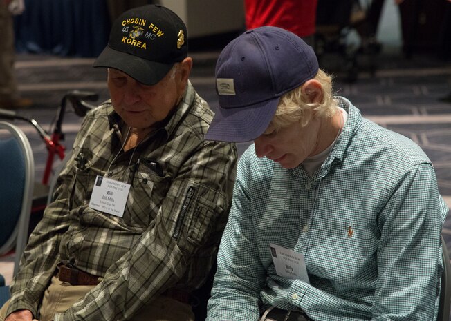 U.S. Marine Corps veterans from the Battle of Chosin Reservoir, and their family members gather at the Sheraton Norfolk Waterside Hotel, Norfolk, Va., for a memorial service to pay tribute to those who passed during the Korean War. The Marines who survived, along with soldiers and sailors are known as the Chosin Few. (Official U.S. Marine Corps photos by Chris Jones/Released)