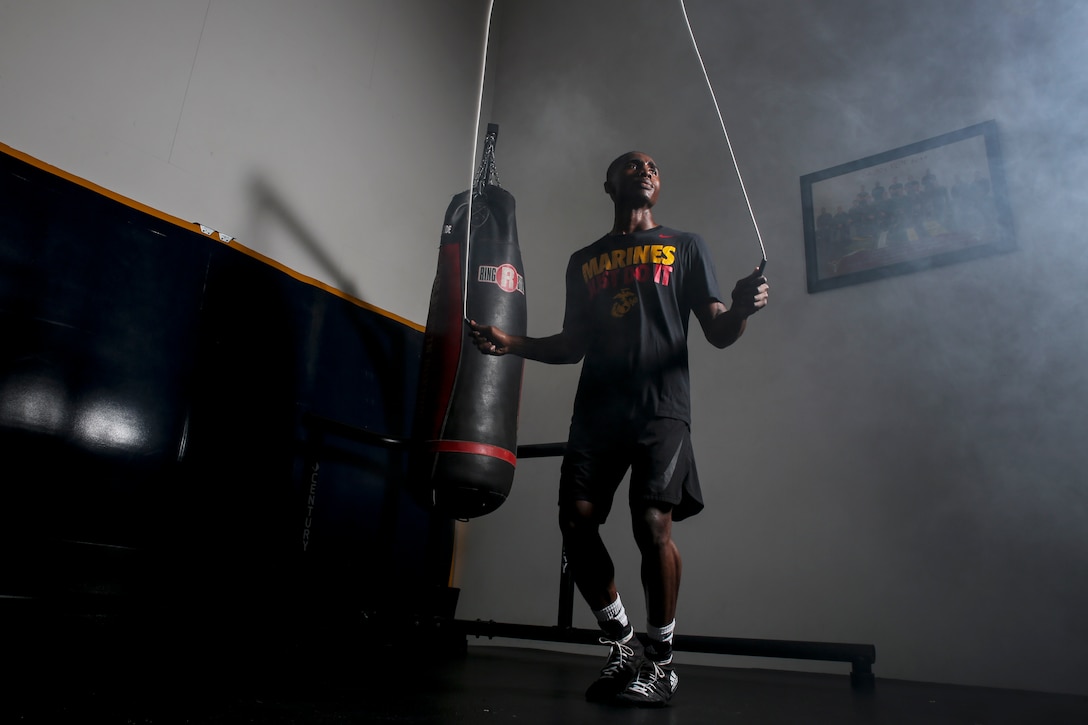 Cpl. Oubigee Jones warms up before a boxing session aboard Marine Corps Air Station Beaufort, Aug. 30. “Just like with boxing, when you strike you are reaching forward, off balance; it’s the same with the Marine Corps,” said Jones, an administrative specialist with Headquarters and Headquarters Squadron. “I have to reach, push myself beyond what I can do to find that balance in life.” Jones is an administrative specialist with Headquarters and Headquarters Squadron.