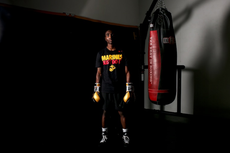 Cpl. Oubigee Jones stands in the gym where he trains nearly every day aboard Marine Corps Air Station Beaufort, Aug. 30. Jones began fighting when he was eight years old. “I grew up in the streets of south Dallas, the hood basically. Everyone started fighting at a young age, whether it be to defend themselves or to earn their stripes.” Jones is an administrative specialist with Headquarters and Headquarters Squadron.