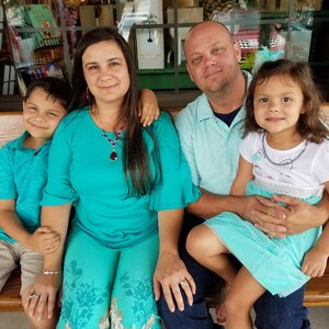 U.S. Army Reserve Staff Sgt. Joel Rogers, assigned to the 2-346th Training Support Battalion, 85th Support Command, pauses for a photo with his family after overcoming a life-impacting event, and taking back charge of his life.