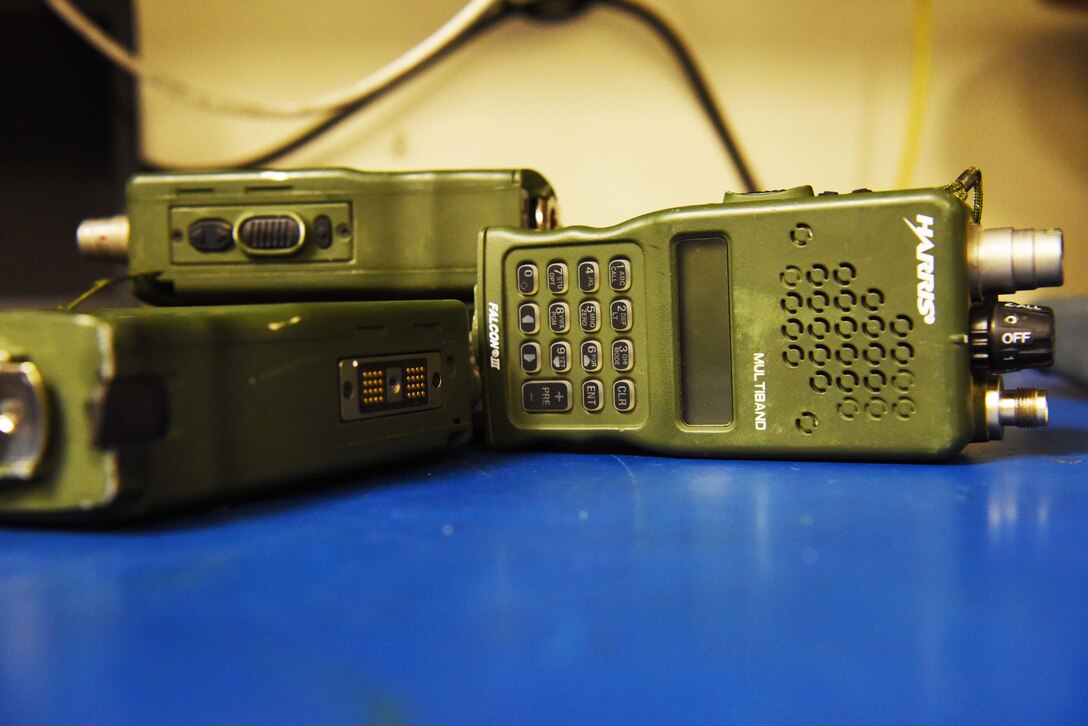 A pile of radios await repair at Ellsworth Air Force Base, S.D., Sept. 5, 2018. The radio maintenance shop is responsible for maintaining and repairing many of the land mobile radios.  They also maintain the base’s mass communication system and also set up and operate public address equipment for community events. (U.S. Air Force photo by Airman 1st Class Thomas Karol)
