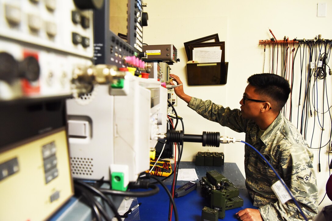 Airman Johnrafael Pena, a 28th Communications Squadron radio frequency technician, uses a distortion analyzer at Ellsworth Air Force Base, S.D., Sept. 5, 2018. The radio maintenance shop is responsible for maintaining and repairing many of the land mobile radios.  They also maintain the base’s mass communication system and also set up and operate public address equipment for community events. (U.S. Air Force photo by Airman 1st Class Thomas Karol)