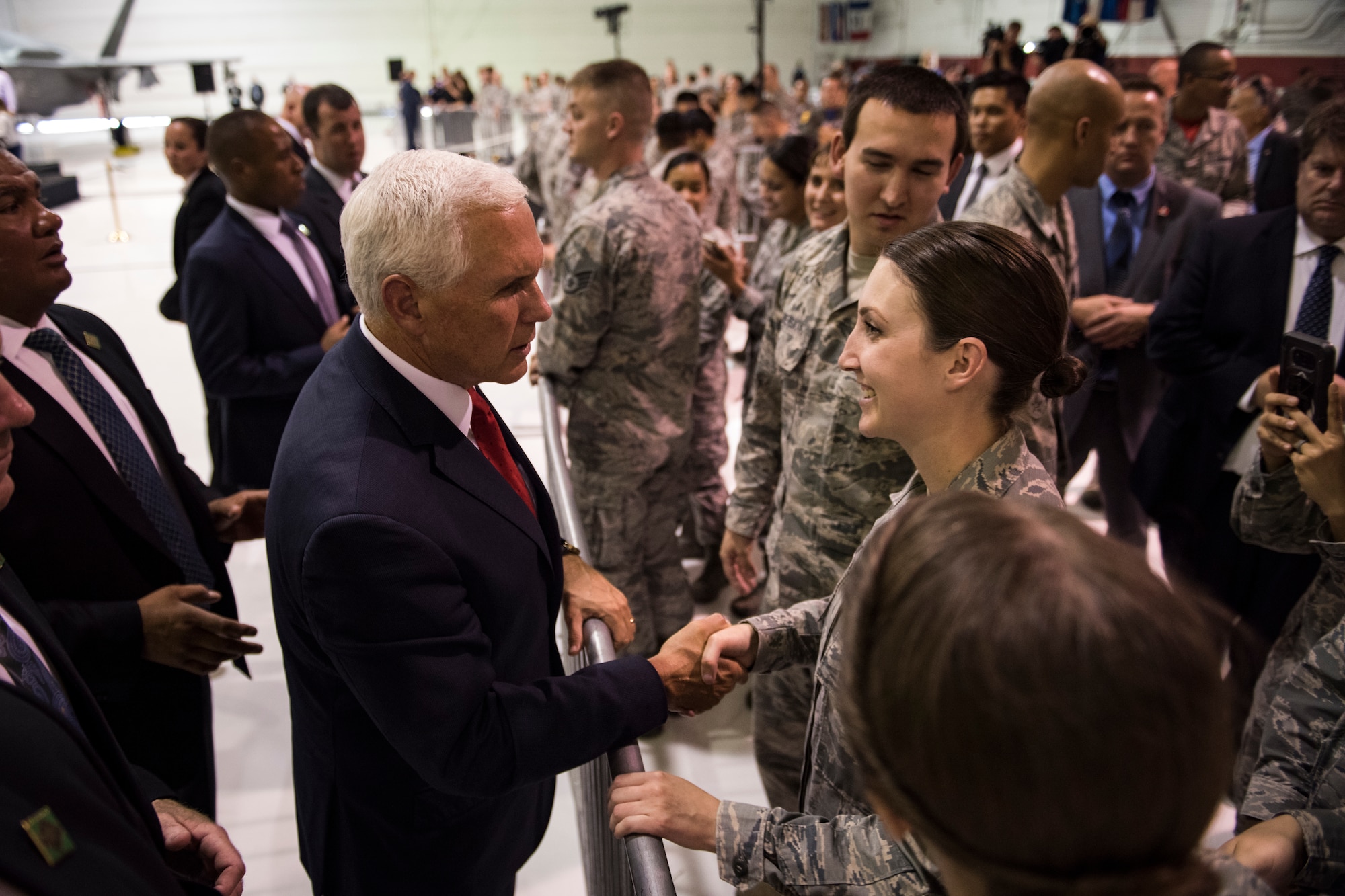 Vice President Mike Pence greets Airmen during a morale visit to Nellis Air Force Base, Nevada, Sept. 7, 2018. Pence took to the stage of the Thunderbirds hangar, home of the U.S. Air Force Aerial Demonstration Squadron, to address Airmen and veterans. (U.S. Air Force photo by Airman 1st Class Andrew D. Sarver)
