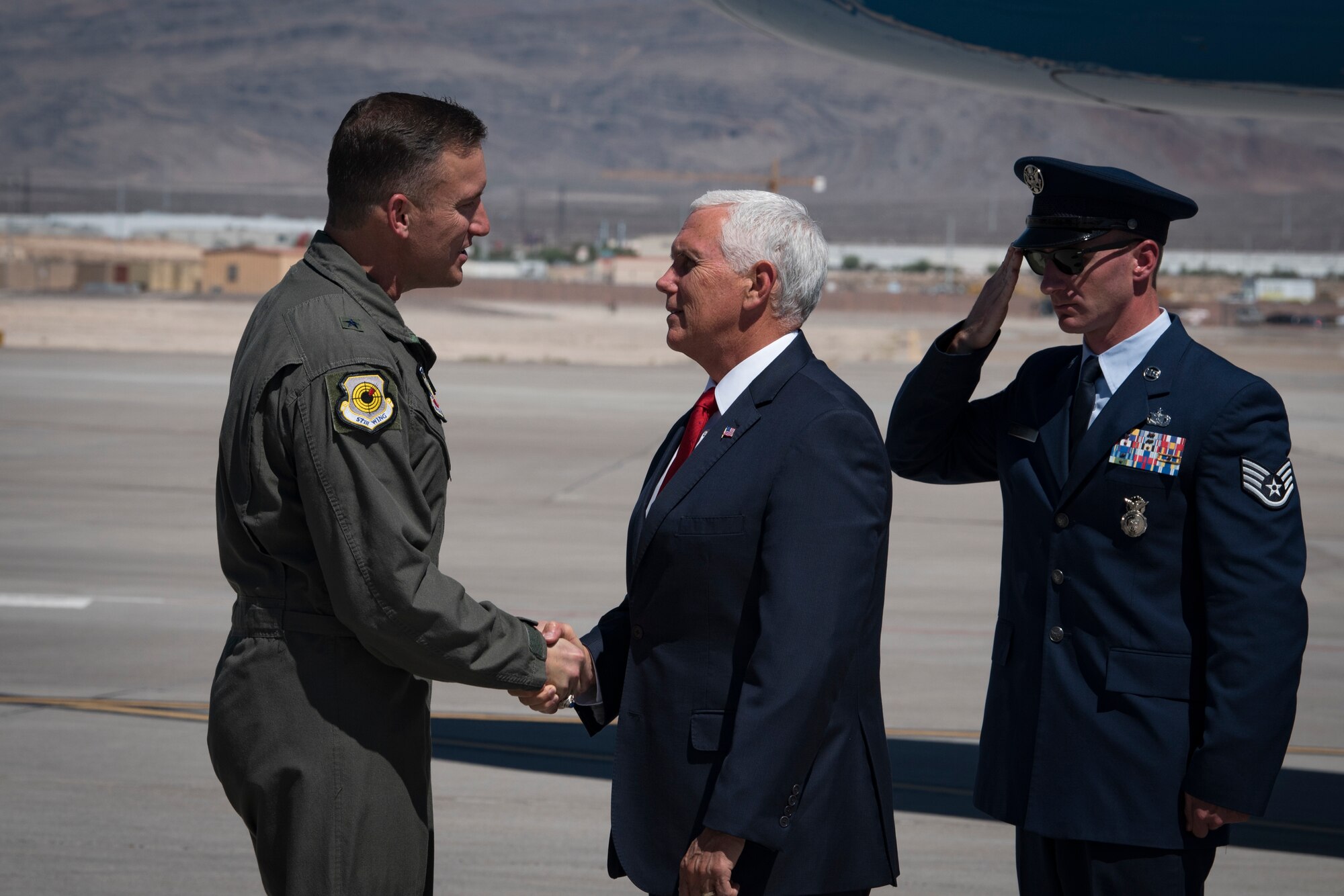 Vice President Mike Pence is greeted by Brig. Gen. Robert Novotny, 57th Wing commander, upon arriving at Nellis Air Force Base, Nevada, Sept. 7, 2018. Upon landing, Novotny and other base leaders escorted Pence to the flightline to converse with the Airmen. (U.S. Air Force photo by Airman 1st Class Andrew D. Sarver)