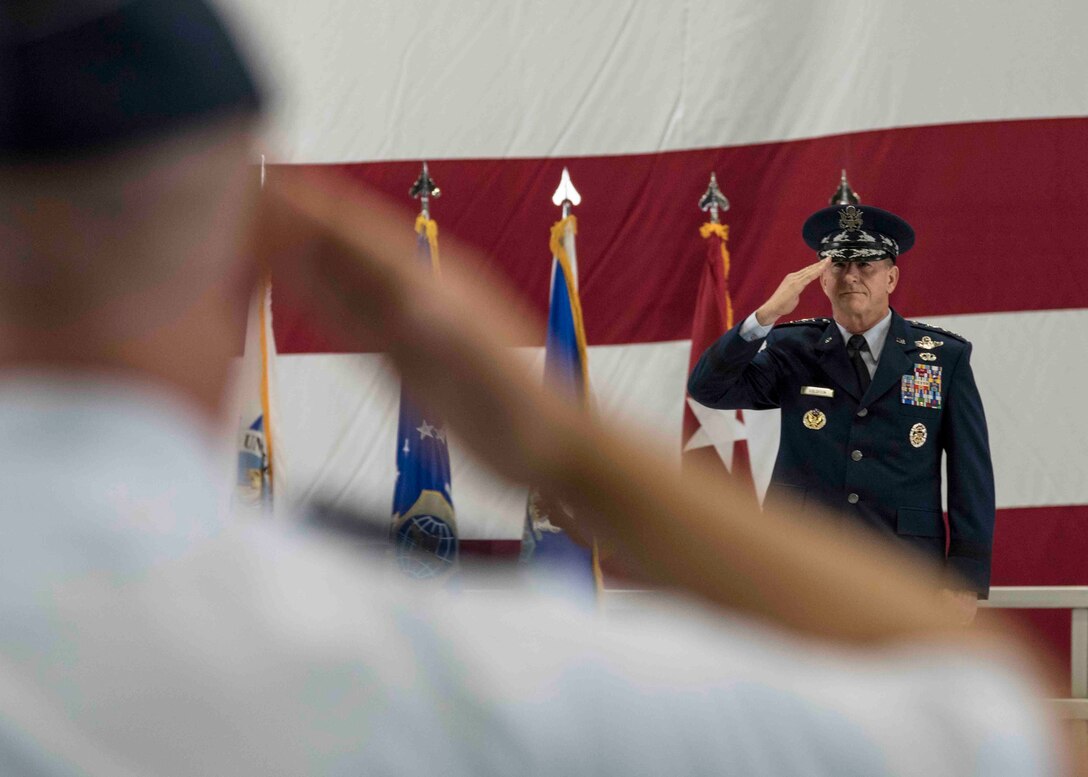 Air Force Chief of Staff Gen. David L. Goldfein salutes the formation during the Air Mobility Command change of command, Scott Air Force Base, Illinois, Sept. 7, 2018. Gen. Maryanne Miller assumed command from Gen. Carlton D. Everhart II, who retires after 35 years of service to the Air Force. AMC provides rapid, global mobility and sustainment for America's armed forces through airlift, aerial refueling, aeromedical evacuation and mobility support. (U.S. Air Force photo by Tech. Sgt. Jodi Martinez)