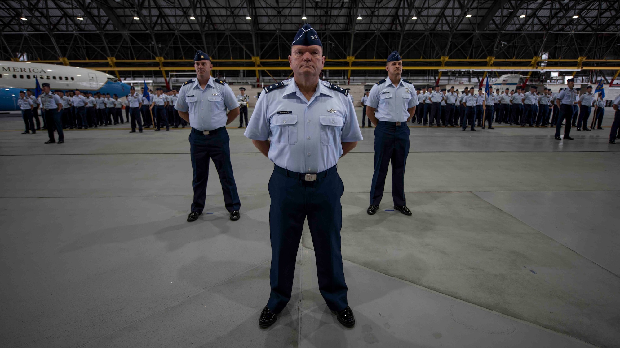 Maj. Gen. Samuel Mahaney, Air Mobility Command chief of staff, stands at parade rest ahead of a four-flight formation for the Air Mobility Command change of command, where Gen. Maryanne Miller will take command of AMC, Scott Air Force Base, Illinois, Sept. 7, 2018. Miller assumed command from Gen. Carlton D. Everhart II, who retires after 35 years of service to the Air Force. AMC provides rapid global air mobility and sustainment for America's armed forces through airlift, aerial refueling, aeromedical evacuation and mobility support. (U.S. Air Force photo by Tech. Sgt. Jodi Martinez)