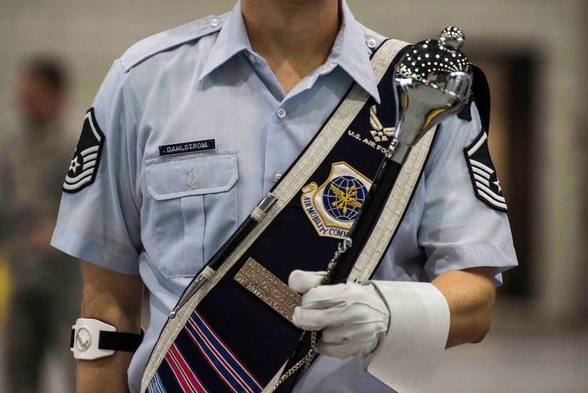 Master Sgt. Peter Dahlstorm, Band of Mid-America readiness section chief, stands in formation for the Air Mobility Command change of command, Scott Air Force Base, Illinois, Sept. 7, 2018. Gen. Maryanne Miller assumed command from Gen. Carlton D. Everhart II, who retires after 35 years of service to the Air Force. AMC provides rapid global air mobility and sustainment for America's armed forces through airlift, aerial refueling, aeromedical evacuation and mobility support. (U.S. Air Force photo by Tech. Sgt. Jodi Martinez)